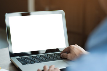 businessman using  laptop with blank screen at cafe