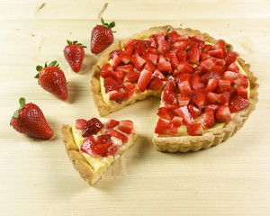 Strawberry pie on wooden background