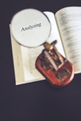 Analyze data conceptual Magnifying glass on Book Reading Research