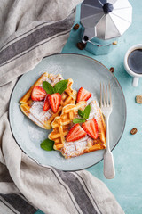 Homemade waffles with strawberries