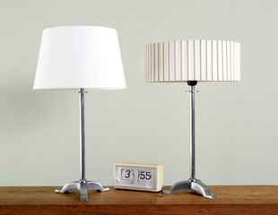 Two vintage metal lamps with white shades