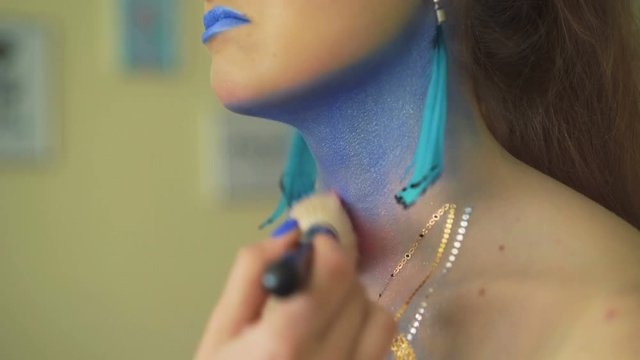 Closeup of process of peahen's bodyart for carnival and halloween for girl 4K