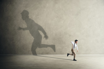 man and his shadows running in different direction