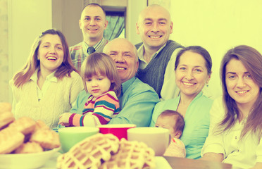 Fototapeta premium large joyful three generations family