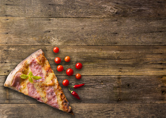 Diferents types of pizza cut on wooden table