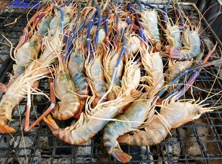 Grilling prawn seafood on on the stove, Close up image