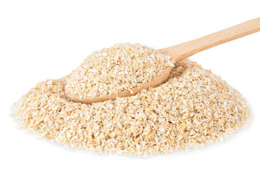 heap of bran with wooden spoon