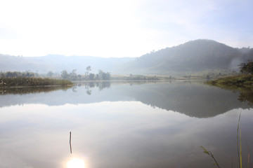 Beautiful landscape in the  forest mountains majestic view Foggy Morning. Fog caused by the Reservoir at Khao Kho National Park, Thailand.