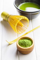 Green matcha tea powder.