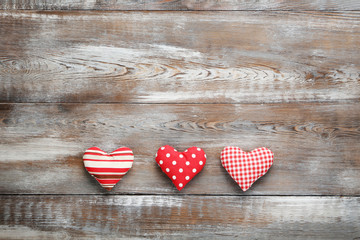 Love hearts on a brown wooden table