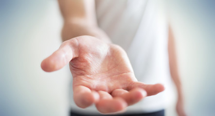 Businessman showing his empty hand