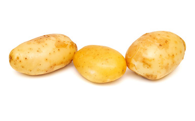 Group of young potatoes isolated on white background. Harvest new. Flat lay, top view