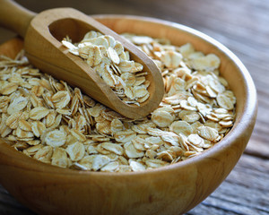 Rolled oats on a wooden table