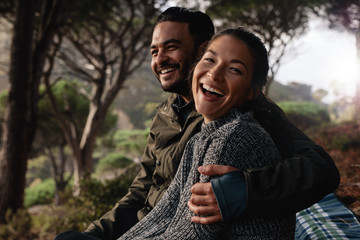 hiker couple resting after hike