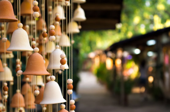 Hand made wind chimes hanging on a string