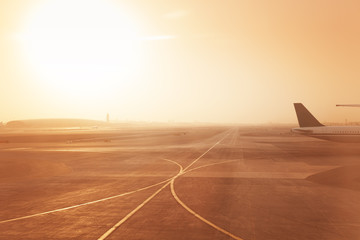 Aircrafts on runway of Dubai International Airport