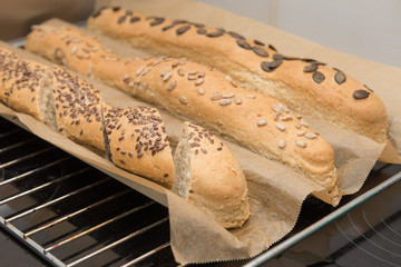Self made wholemeal baguettes with spelt, sunflower, sesame and pumpkin seeds
