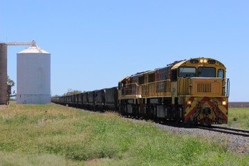 Railway line with coal train close up