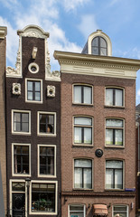 Fototapeta premium Traditional old buildings in Amsterdam