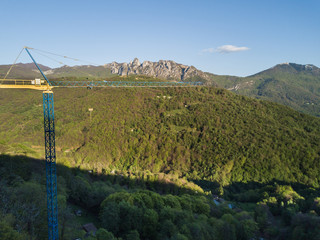 Aerial view of crane in alpine valley