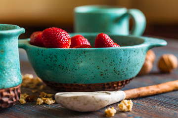 strawberries, granola with fresh yogurt for healthy breakfast