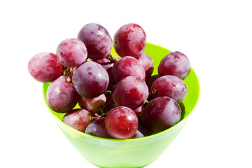 Red grape with mint in a green bowl