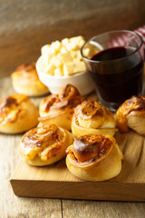 Homemade cheese buns with tomato sauce and herbs