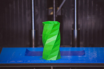 Objects printed by 3d printer. Automatic three dimensional 3d printer performs plastic modeling in...