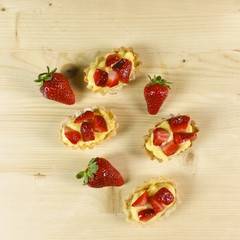 Strawberry pie on wooden background - top view