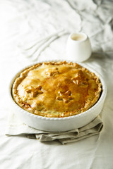 Savory pie with chicken and mustard sauce