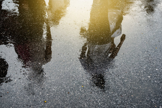 Puddle of water in rain - selective focus