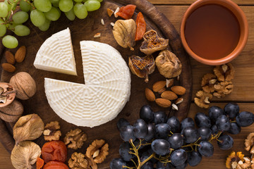 Cheese platter with fruits, homemade indian paneer