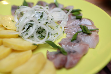 Salted herring with onions