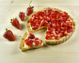 Strawberry pie on wooden background