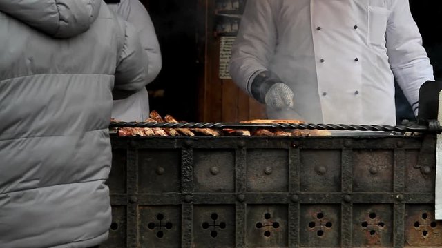 Preparing tasty shashlik at open-air restaurant in Moscow, Russia 