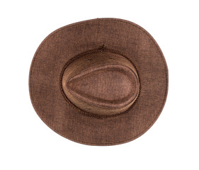 Brown cowboy hat on white isolated background, close-up, top view
