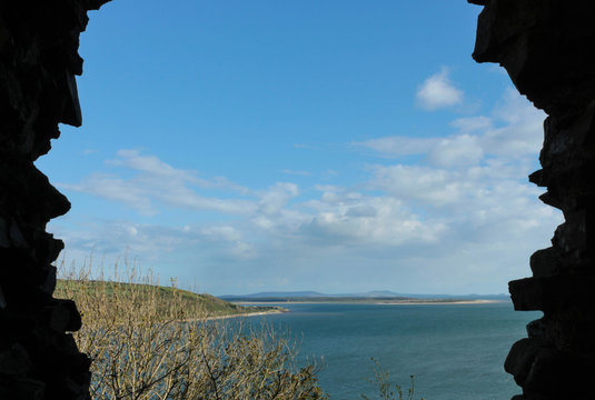 Window on Pembrey - Pembrey penisula taken through a window of the ruined Llansteffen Castle