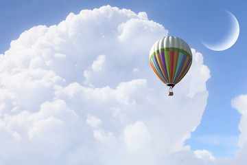 Aerostat flying above clouds