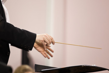 Hands of conductor closeup