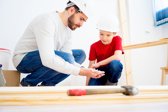 Father And Son Working Together