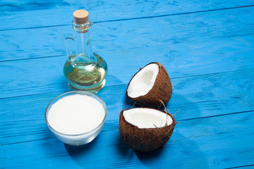 Coconut oil on a blue wooden background