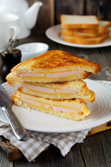 French toast  cheese and bacon with  on a  old wooden background. Selective focus.