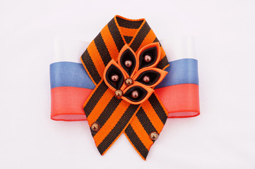 Festive brooch with a St.George's Ribbon