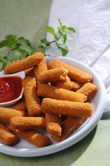 Breaded fried cheese fingers with mint & Ketchup