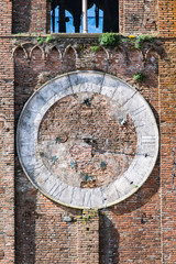 Detail of broken and ruined clock of a bell tower.