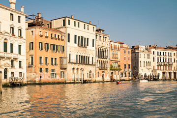 Historic buildings on the banks of the grand canal in Venice.
