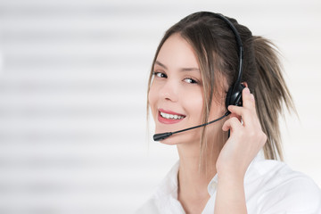 Female call center operator - obrazy, fototapety, plakaty