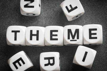 word theme on toy cubes