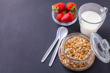 Muesli with milk and strawberries