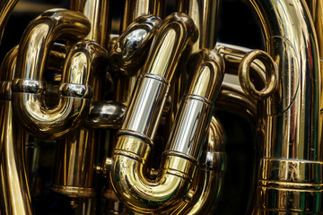 Detail of the brass pipes of a tuba - obrazy, fototapety, plakaty